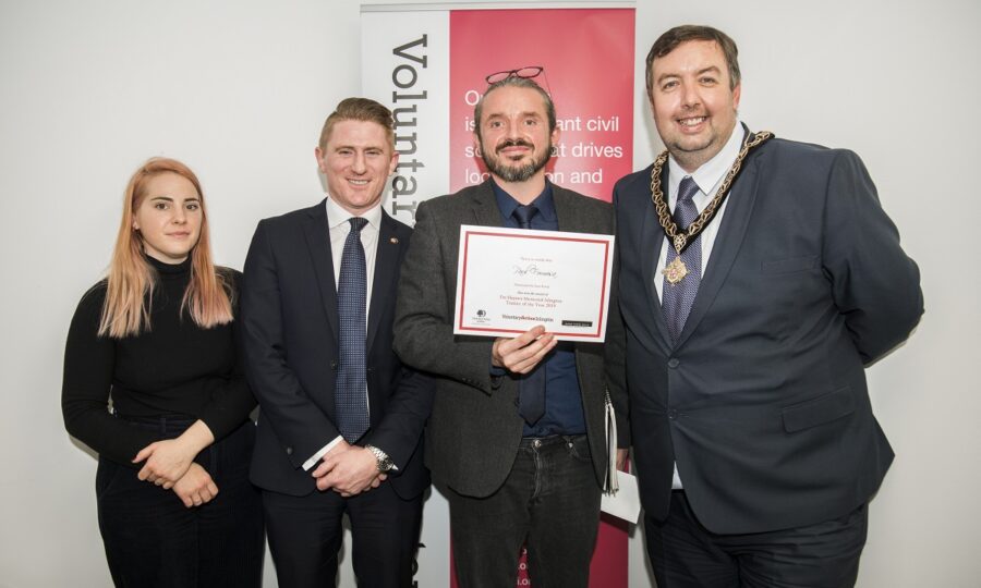 Paul, holding certificate, wins Islington Trustee of the Year 2019