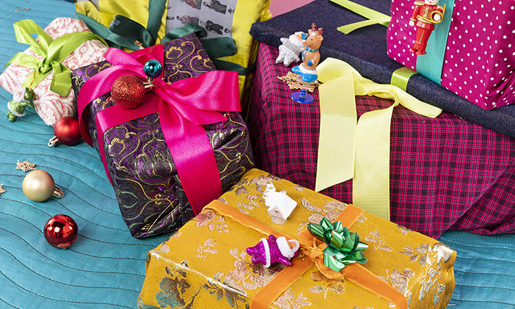 Christmas gifts in colourful wrapping and bows