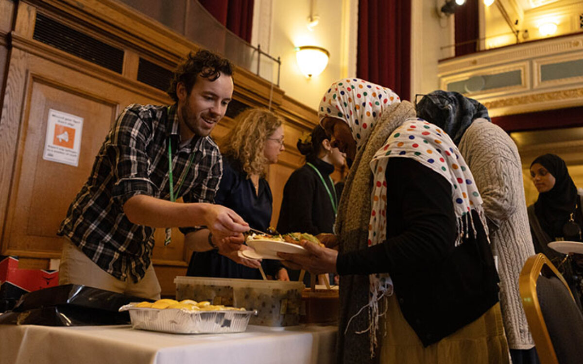 Guests being served food at the Borough of Sanctuary celebration event