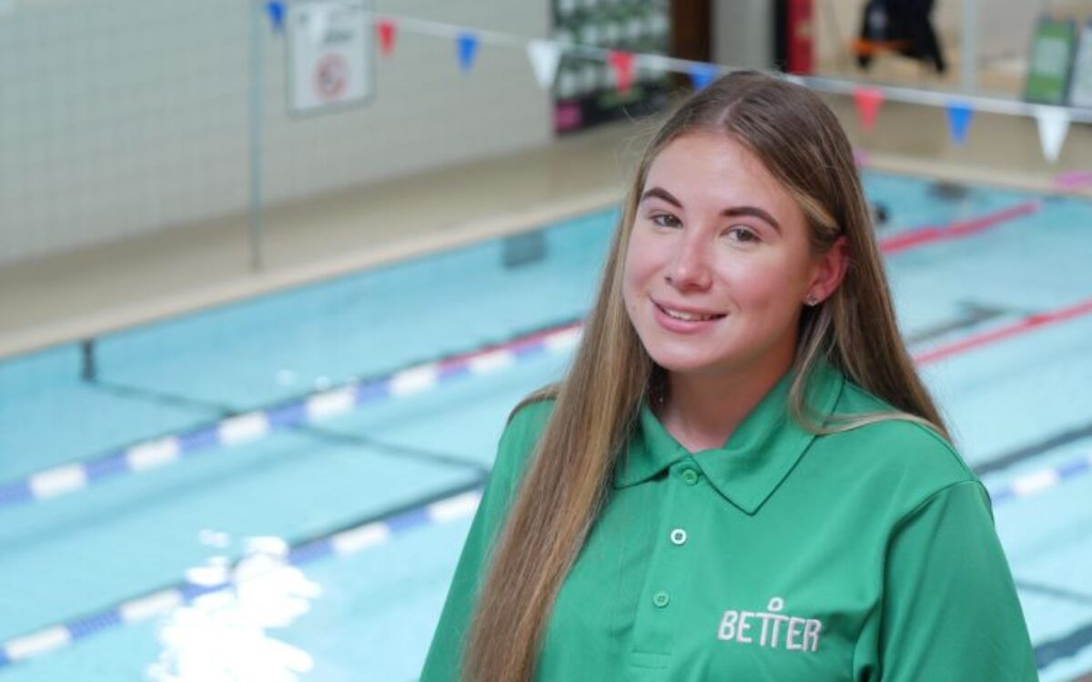 Mia Bassett lifeguard at Better gyms in front of a swimming pool