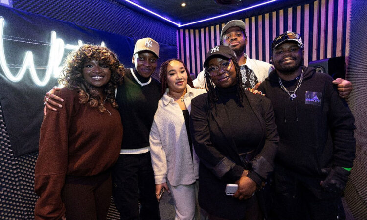 White Lion Studio - Tyrese (far right) with Little Simz at the opening of White Lion Studio